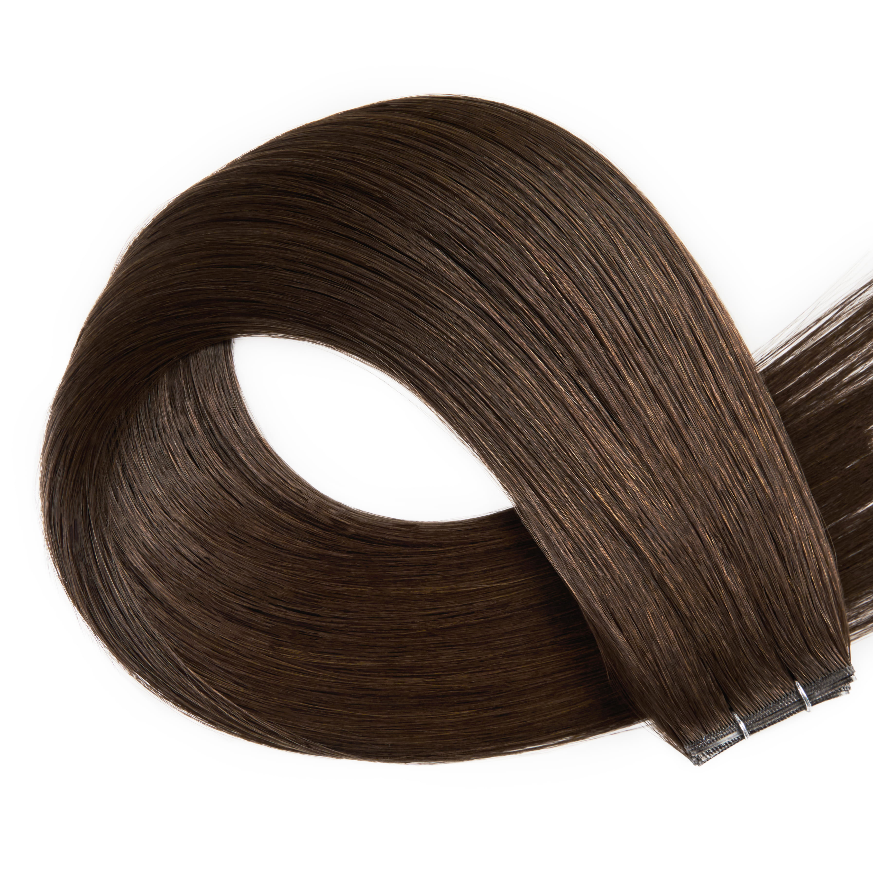 Smooth, straight brown hair extensions styled in a wavy shape, showcasing texture and shine, ideal for beauty or hairstyling discussions.